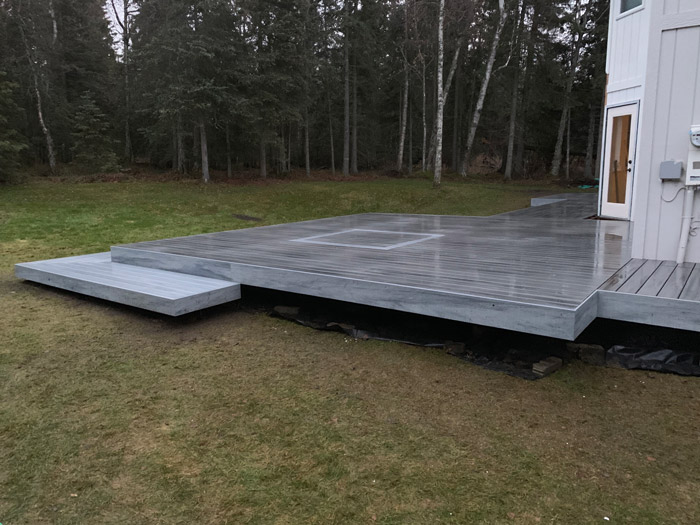 Grey composite Trex deck low to the ground
